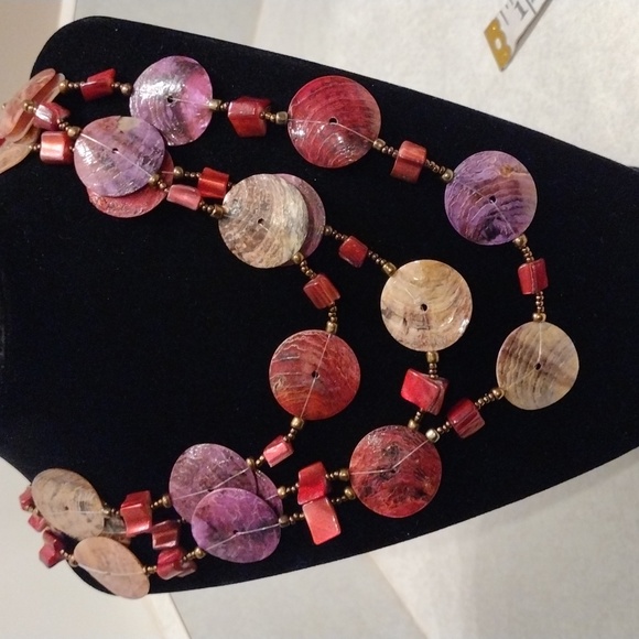 Jewelry - Beautiful triple strands of shell's and beads necklace.